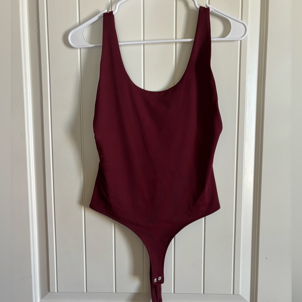 sexy maroon body suit. Never worn!